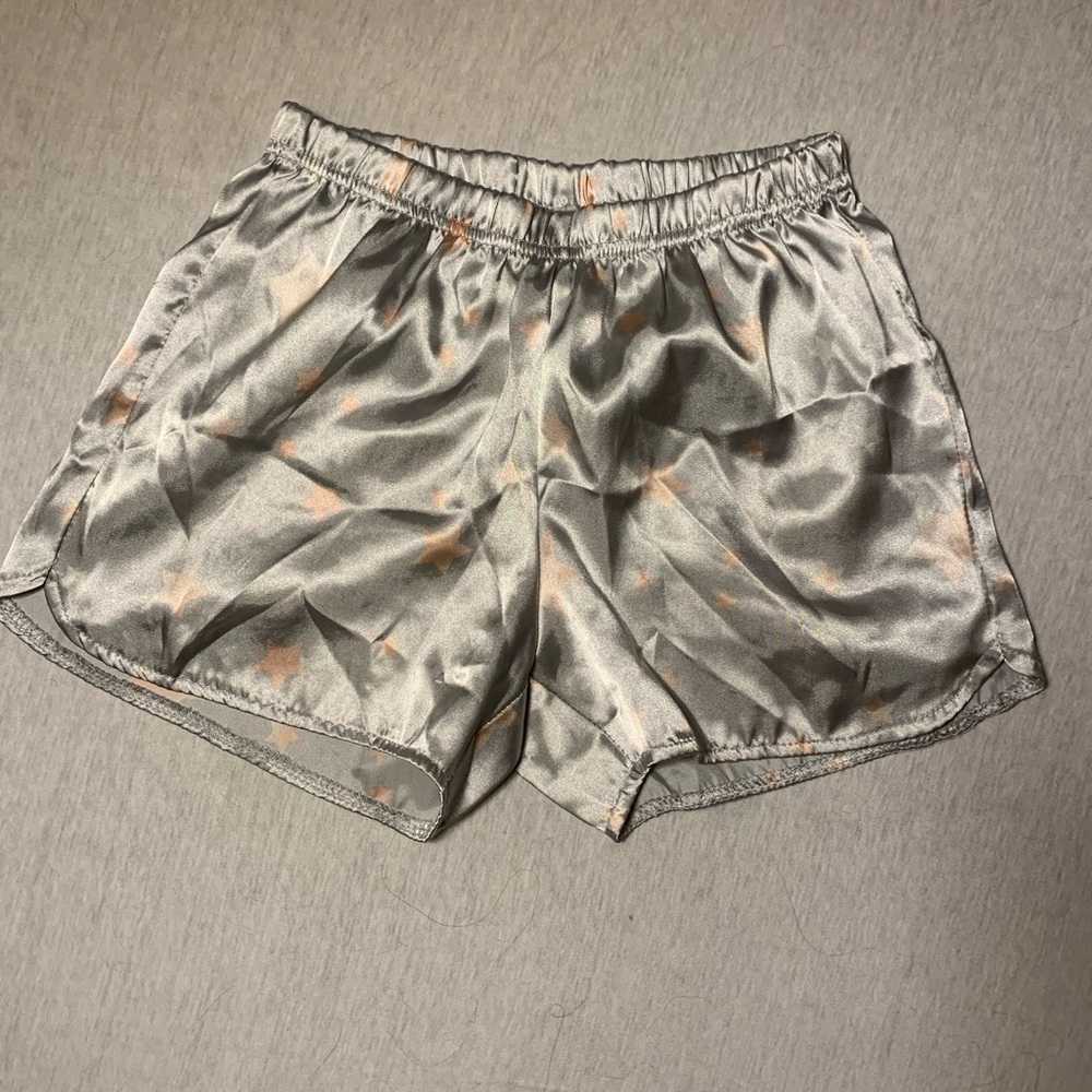 Kids size medium silver and pink silk shorts